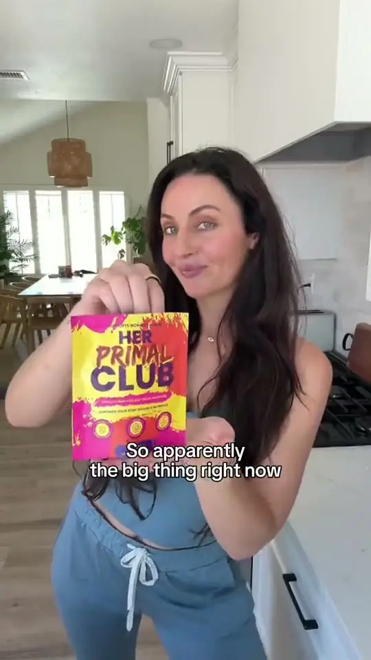 Creator holding a supplement box to camera, sceptical about the trend